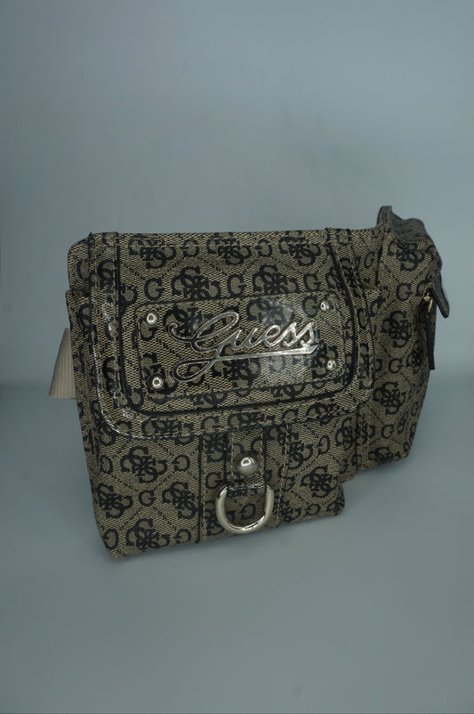 Patterned guess fanny pack with a brand logo on a light gray background